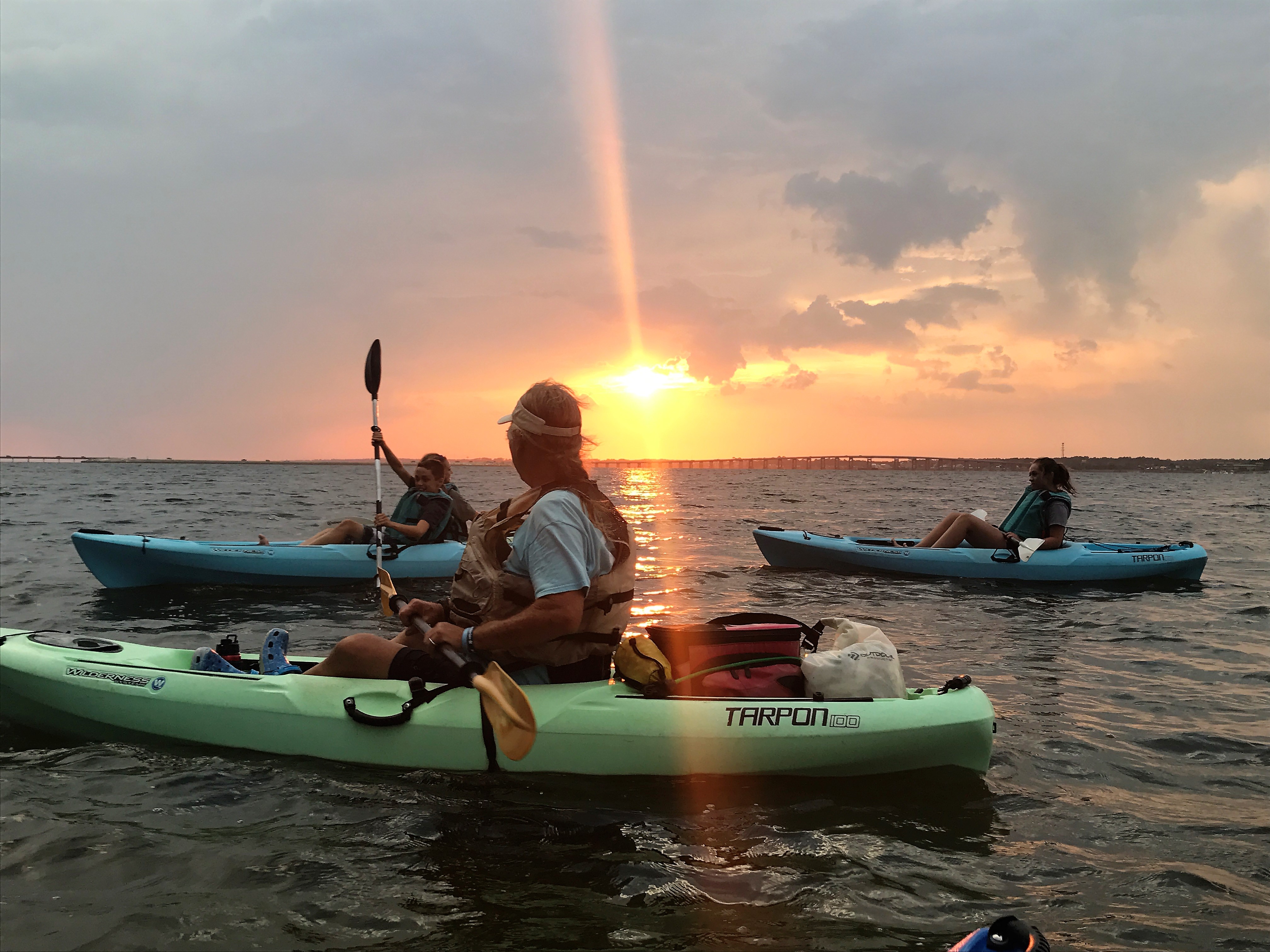Kayak Dave kayaking at sunset